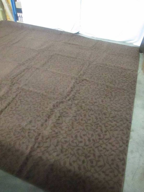 lot 22 image: Garland Rug Ivy 9 x 12 Area Rug - Brown