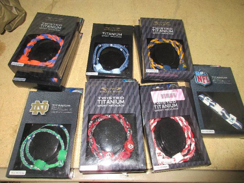 assorted college football lanyards and one Dallas cowboys