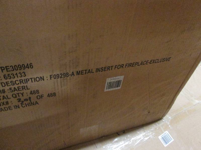 lot 82 image: Metal Insert For Fireplace open box...