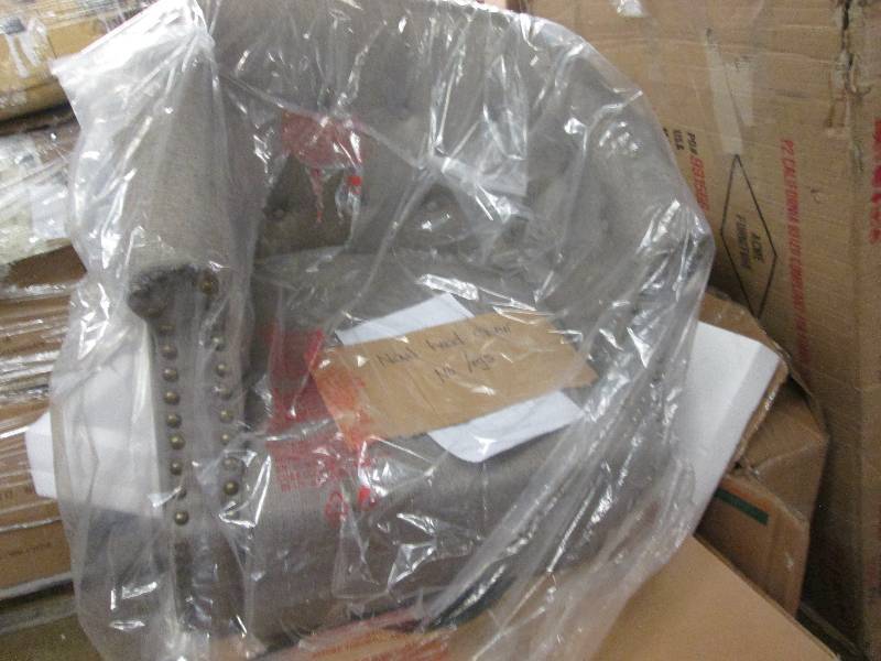 lot 83 image: Nailhead Chair out of box, no legs ...