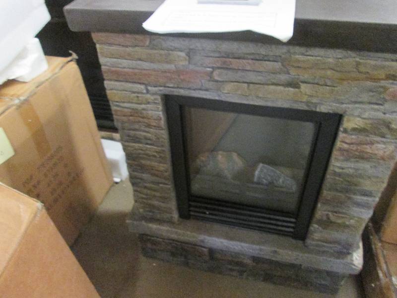 lot 179 image: Faux Stone Electric Fireplace open ...