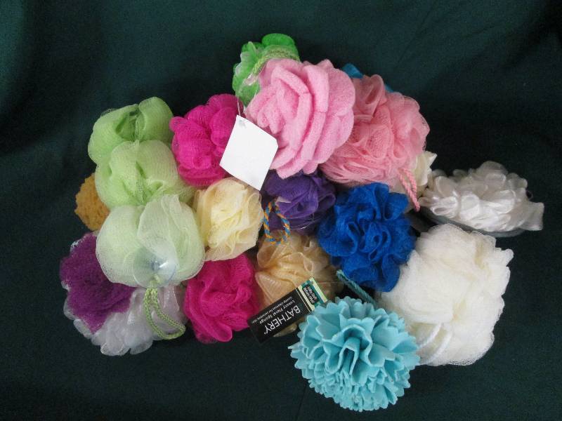 20 bath scrubbys all new ...