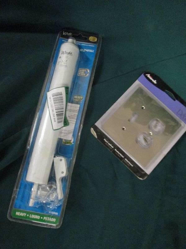 storm door closer and a light switc...
