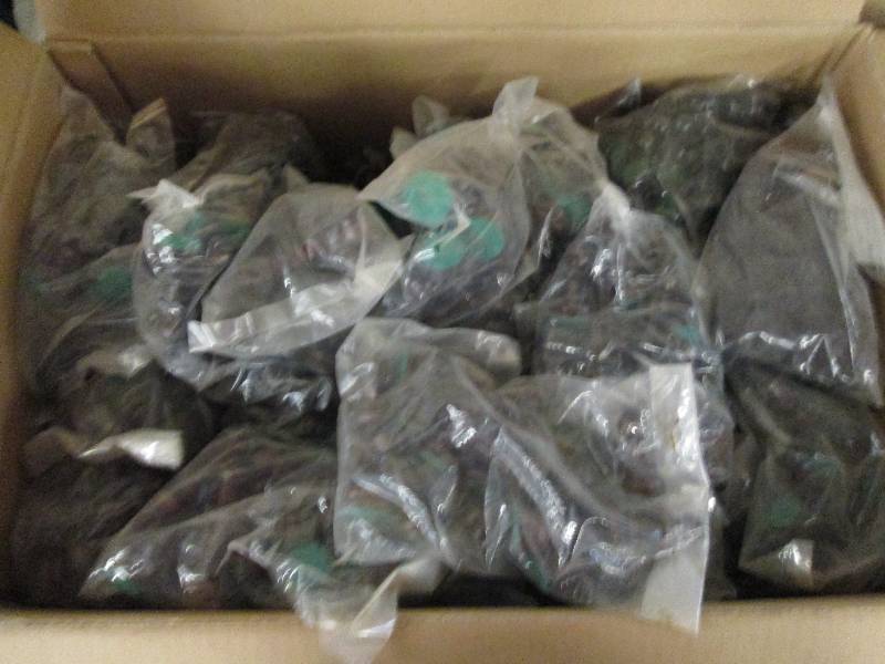 box full of wood chess pieces ...