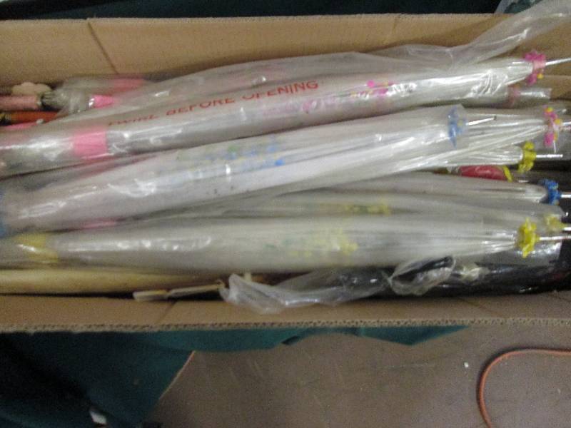 lot of umbrellas all look new but s...