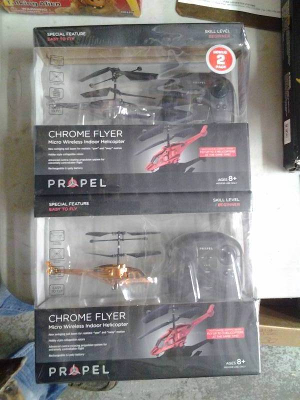 lot 1 image: New 2-Pack Chrome Flyer Helicopters With Remote Controls