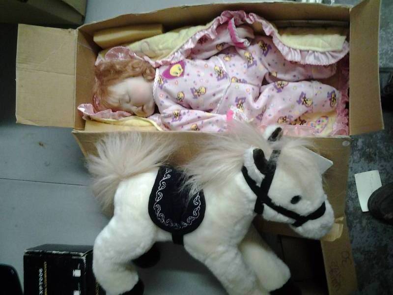 lot 6 image: Ashton Drake Porcelain Face Baby Doll, Wells Fargo Pony