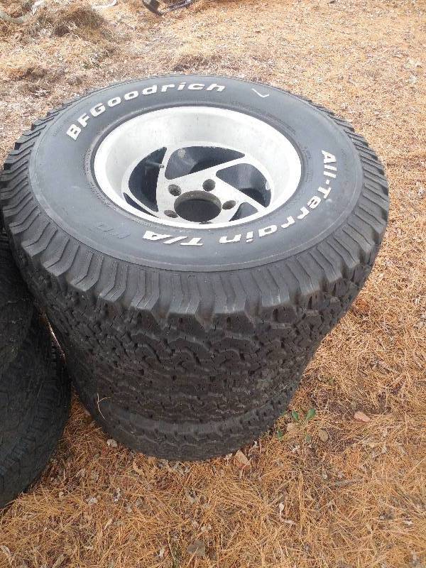 lot 7 image: 3 BF GOODRICH TIRES & RIMS