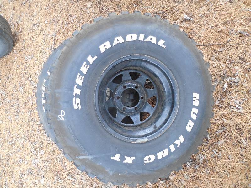 lot 8 image: 2 35 MUD KING XT TIRES & RIMS
