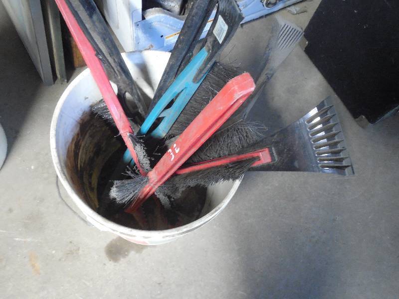 lot 32 image: PAIL OF ICE SCRAPERS