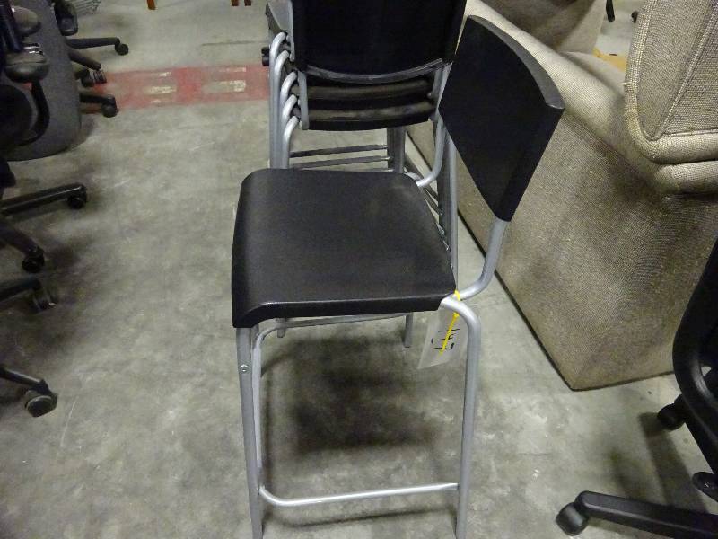 Six Black Stacking Chairs