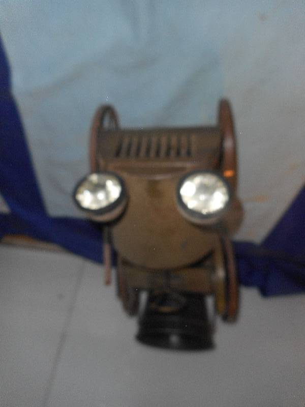 lot 2 image: COLLECTIBLE CAR PLANTER