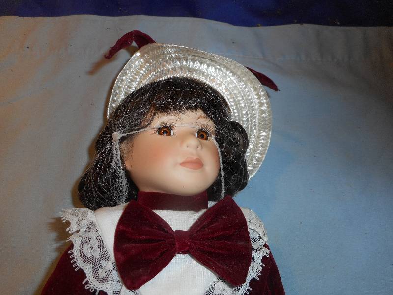 lot 8 image: HAND CRAFTED PORCELIAN DOLL