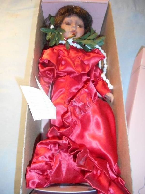 lot 29 image: KAUMEALANI HULA DOLL