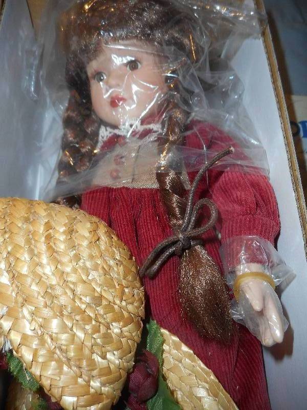 lot 31 image: PORCELAIN DOLL