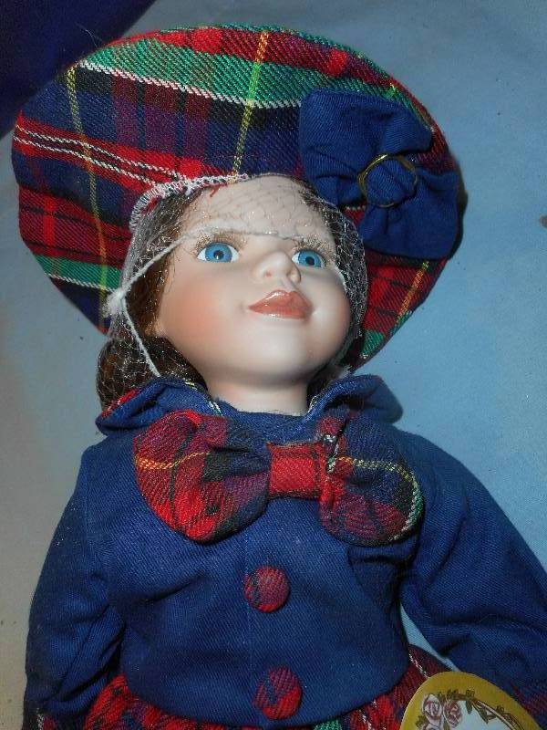 lot 34 image: CROWN FINE PORCELAIN DOLL