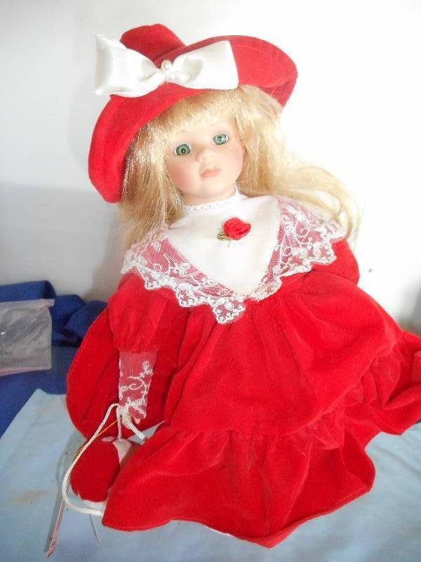 lot 47 image: YULE TIDE SPLENDER PORCELAIN DOLL