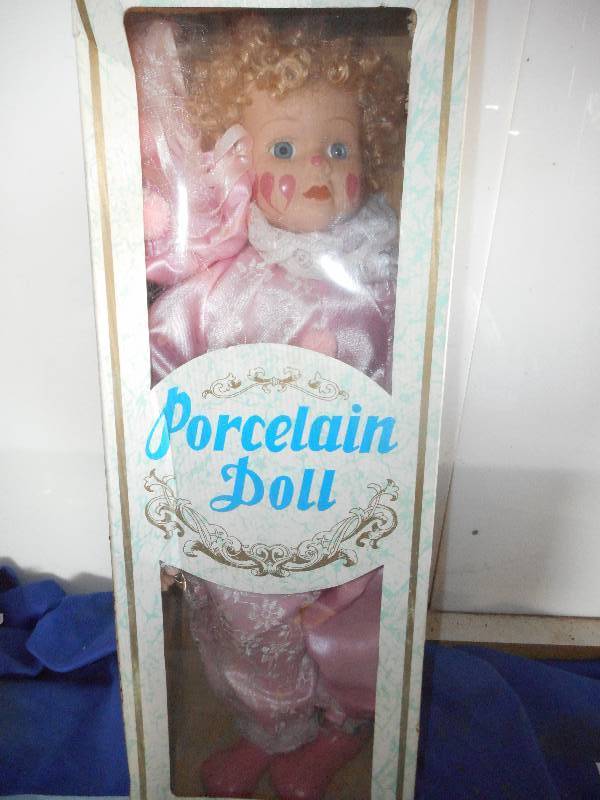 lot 49 image: PRINCESS COLLECTION PORCELAIN CLOWN DOLL