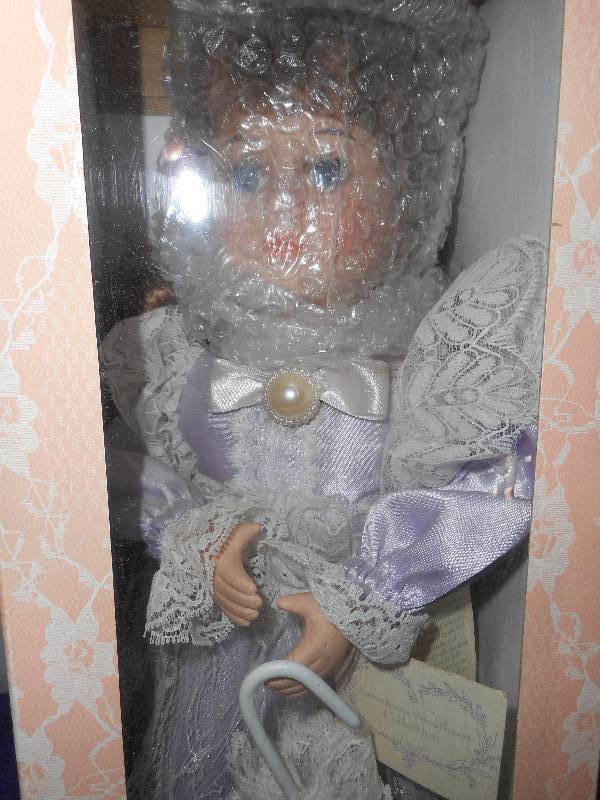 lot 50 image: SWEET HEART COLLECTION PORCELAIN DOLL
