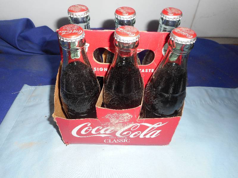 lot 68 image: COLLECTIBLE COKE BOTTLES