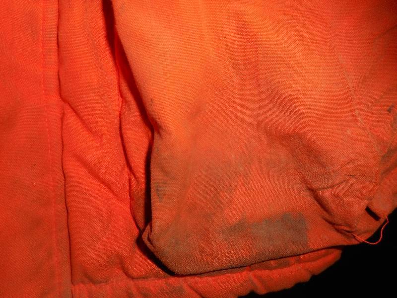 lot 143 image: SMALL BLAZE ORANGE JACKET