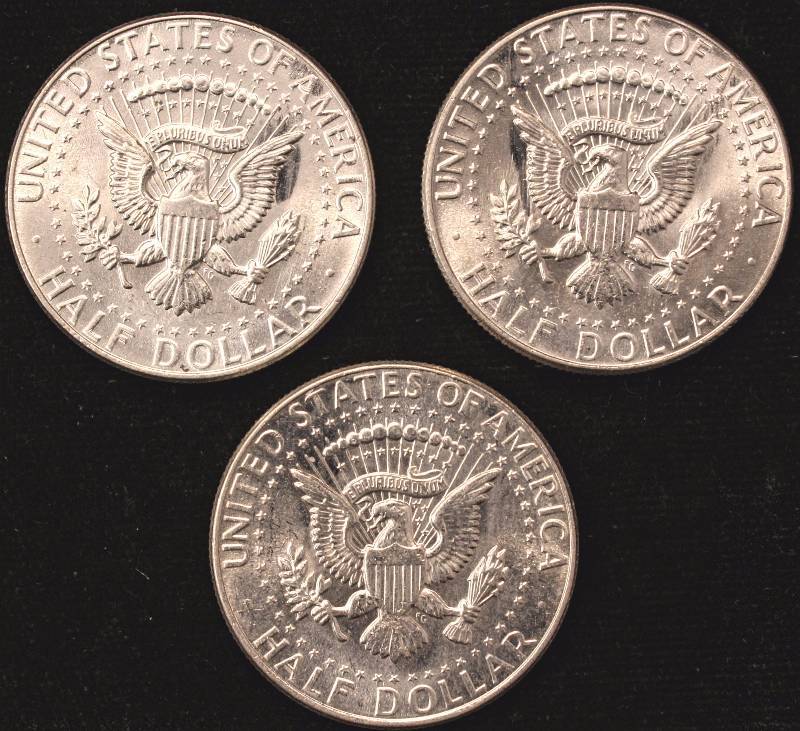 lot 04 image: GROUP OF 3 BU-UNC 1964 KENNEDY HALF DOLLARS