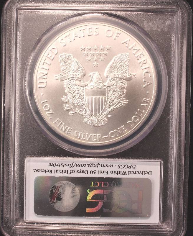 lot 35 image: 2013 AMERICAN SILVER EAGLE 1 TROY OZ. .999 FINE SILVER DOLLAR MS69 PCGS FIRST STRIKE