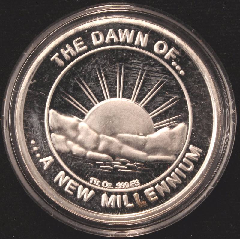 lot 78 image: 1 TROY OZ. .999 FINE SILVER ROUND 2000 MILLENNIUM IN AIRTITE HOLDER