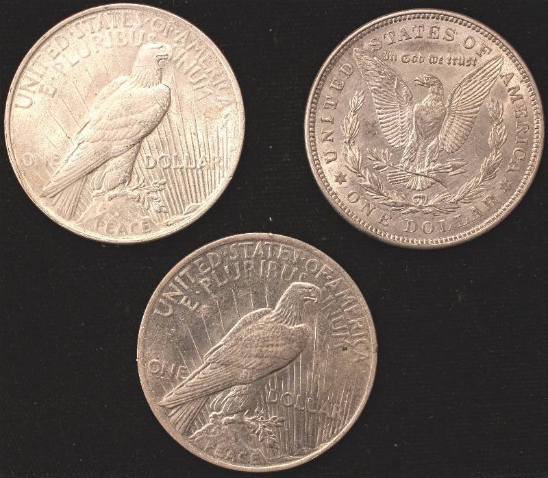 lot 80 image: GROUP OF 3 UNC SILVER DOLLARS 1921 MORGAN, 1922 & 1923 PEACE