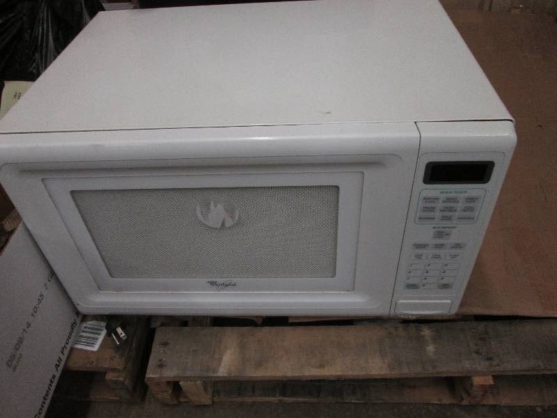 lot 13 image: White Whirlpool Microwave...