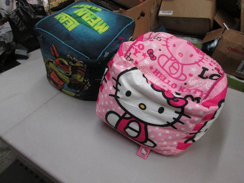 lot 77 image: Mutant Ninja Turtle & Hello Kitty C...