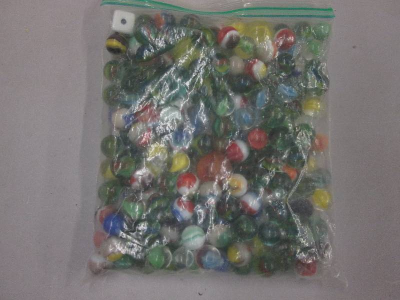 lot 110 image: Ziplock of Marbles...