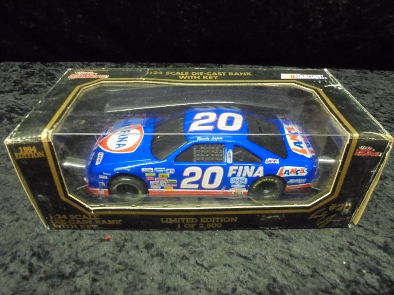 lot 13 image: Racing Champions 124 Diecast Bank - #20 Fina
