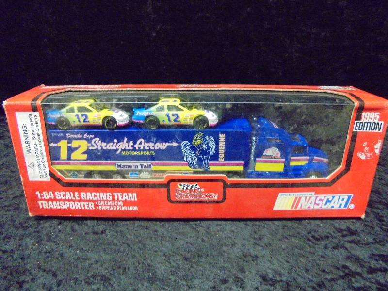 lot 49 image: Racing Champions 164 Race Team Transporter, #12 Straight Arrow