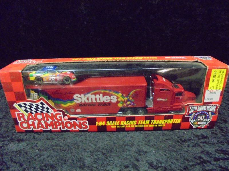 lot 52 image: Racing Champions 164 Race Team Transporter, #36 Skittles