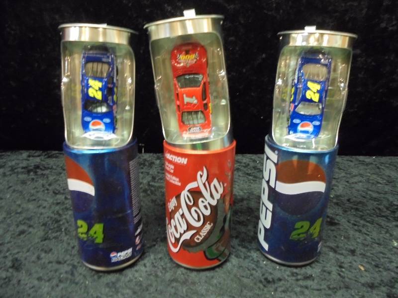 lot 83 image: Lot - Pepsi & Coke Cans with 164 Diecasts