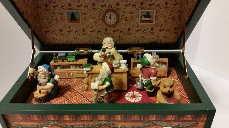 Wind up Christmas Music Box which plays Santa Claus is Coming to Town When Opened While Figurines Move