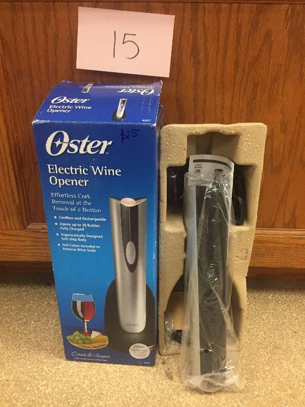 lot 15 image: Oster Cordless Electric Wine Bottle Opener with Foil Cutter, FFP open box never used , Stock and actual photos used to display item