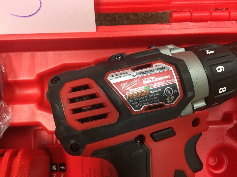 lot 53 image: Milwaukee 18V 12 Drill Driver Kit in like new condition