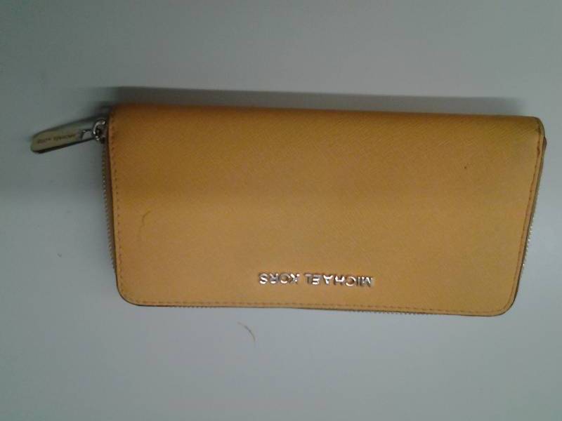 lot 28 image: Michael Kors Wallet