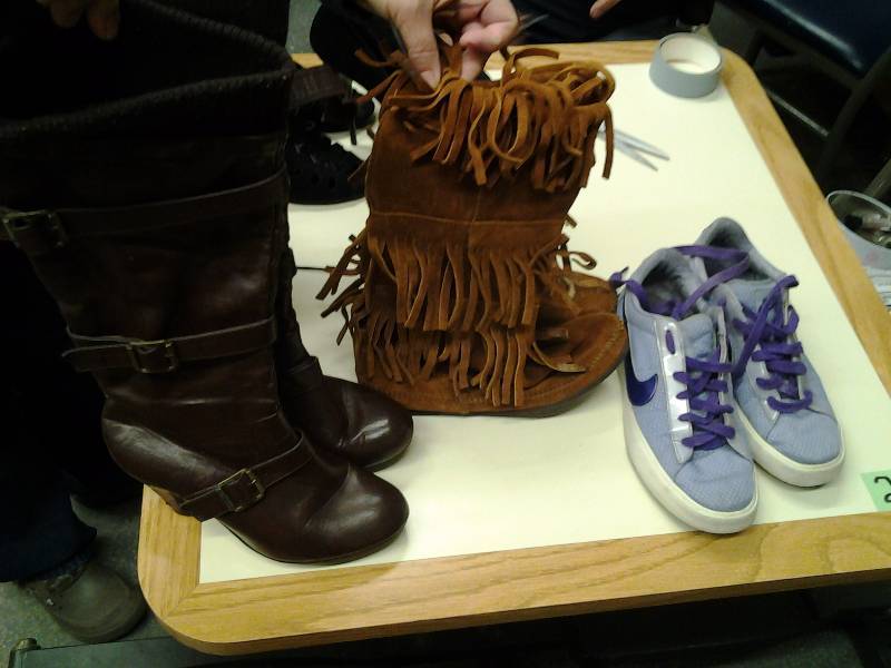 lot 46 image: Minnetonka Moc Size 9, Nike Shoes Size 8 12, Brown Boots Size 8 12