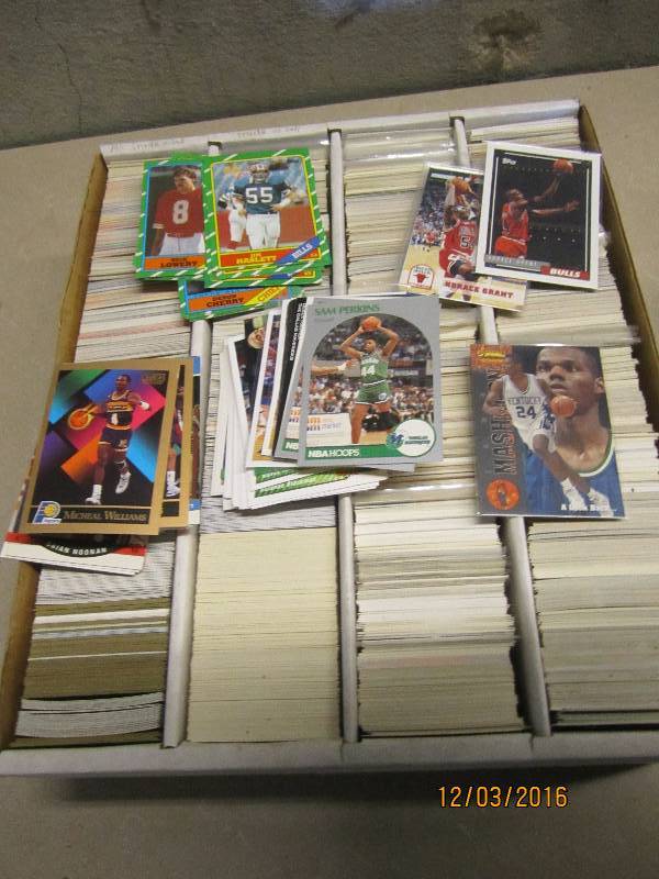 Box of assorted sports cards...