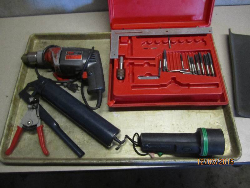 Metal pan of assorted tools...