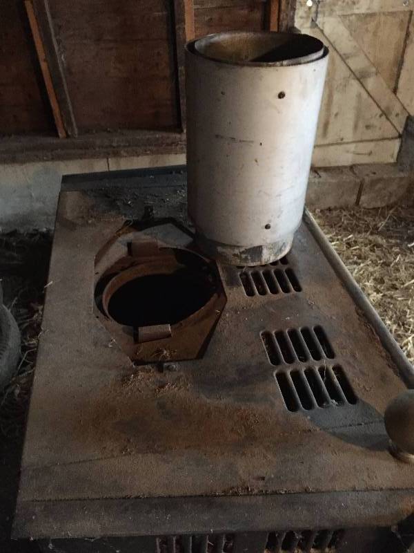 OLD WOOD STOVE FIREPLACE IN NICE SHAPE
