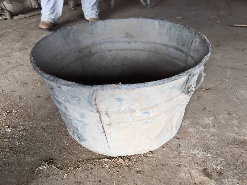 OLD WASH TUB ABOUT 2 FEET ACROSS