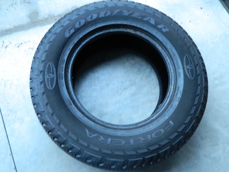 lot 11 image: Near New Goodyear 26570R17 Tire