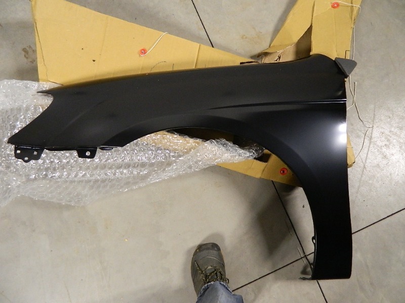 lot 112 image: New LH Fender for Kia Spectra