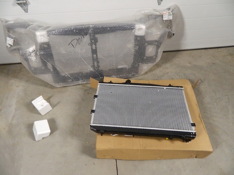lot 114 image: New Radiator and Radiator Support for Kia Spectra