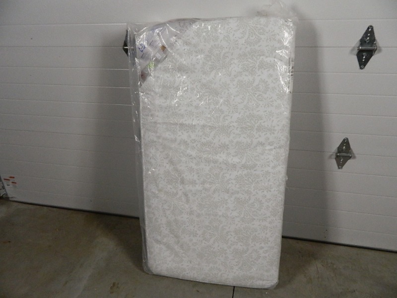 lot 125 image: New Sealy Crib Mattress