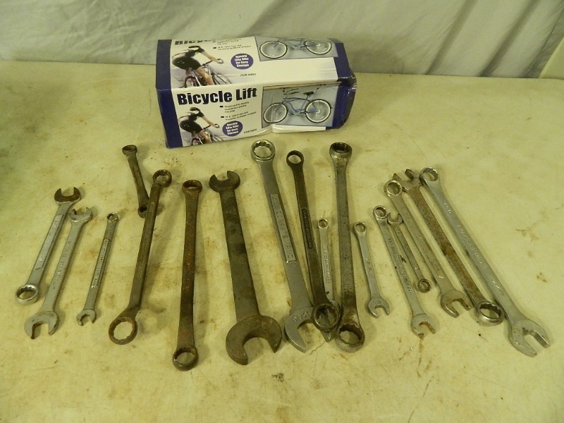 lot 206 image: Assorted Wrenches and Bicycle Lift